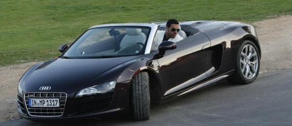 John Abraham looks out of his Audi R8 Spyder in a still from the upcoming Race 2